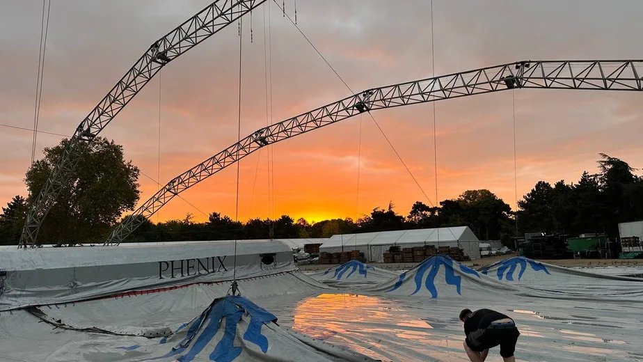Canvas laid out under the arches at sunset